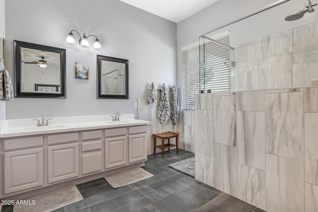 bathroom featuring walk in shower, tile patterned floors, vanity, and ceiling fan