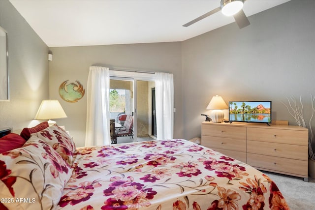 bedroom with vaulted ceiling, a ceiling fan, access to exterior, and light colored carpet