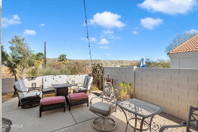 view of patio featuring a fenced backyard