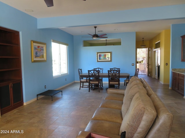 living room featuring ceiling fan