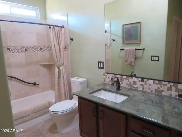 full bathroom with tile patterned floors, toilet, backsplash, shower / tub combo with curtain, and vanity