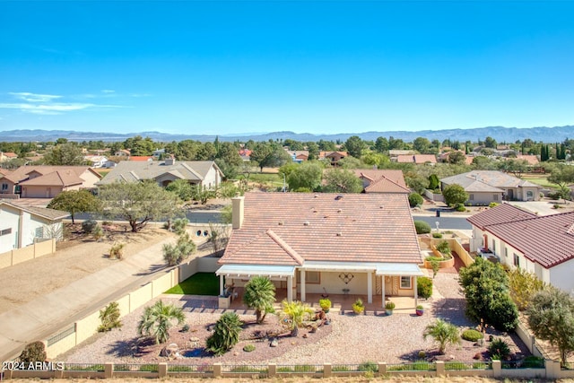 aerial view featuring a mountain view and a residential view