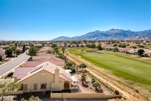birds eye view of property featuring a residential view, a mountain view, and golf course view