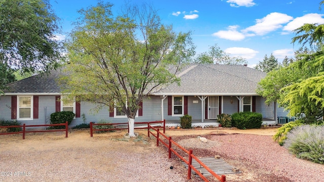 single story home with covered porch