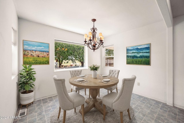 dining room featuring a chandelier