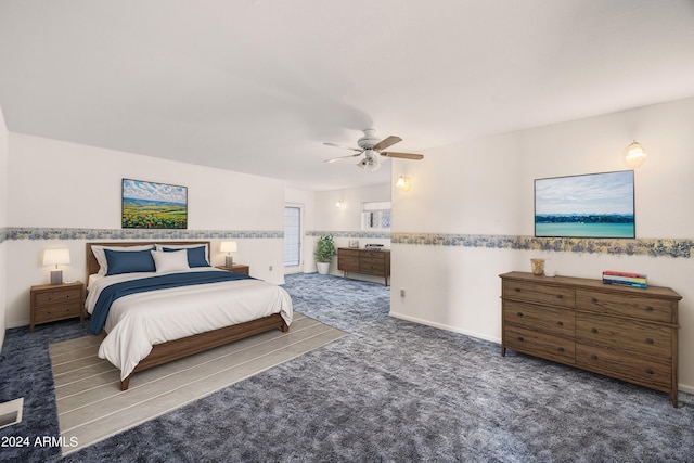 carpeted bedroom with ceiling fan