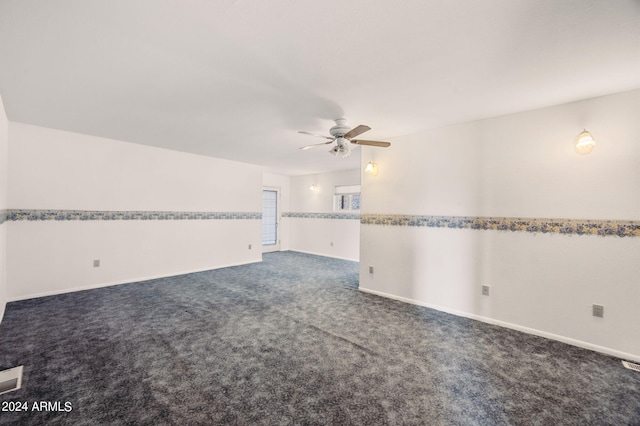 carpeted empty room with ceiling fan