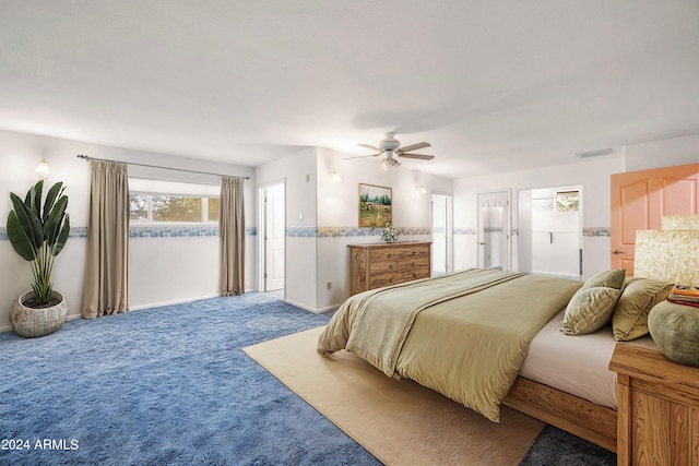 bedroom with ceiling fan and carpet floors