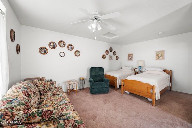 bedroom with light colored carpet and ceiling fan