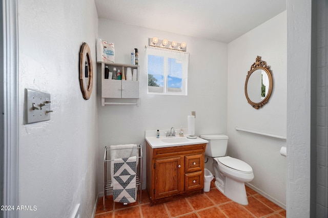 1120 N Rd 1 E, Chino Valley, AZ 86323 - bathroom with vanity, toilet, and tile patterned floors