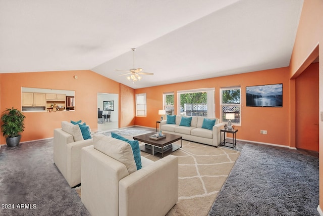 living room with lofted ceiling, carpet floors, and ceiling fan