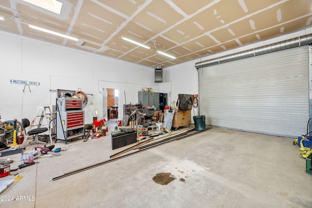 garage featuring a workshop area