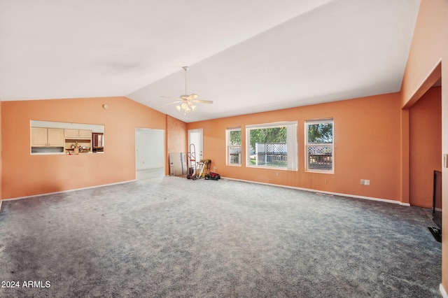 1120 N Rd 1 E, Chino Valley, AZ 86323 - unfurnished living room with lofted ceiling, ceiling fan, carpet flooring, and baseboards