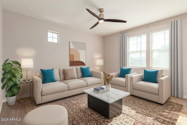 living room with ceiling fan and plenty of natural light