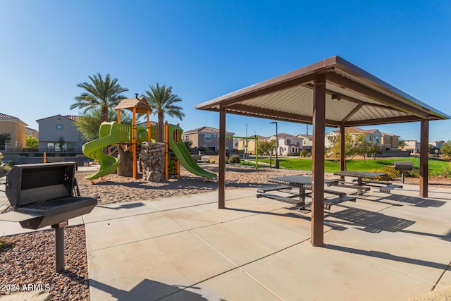 view of patio with a playground