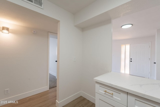 909 S Acapulco Ln Unit A, Tempe, AZ 85281 - interior space featuring light wood-type flooring and baseboards