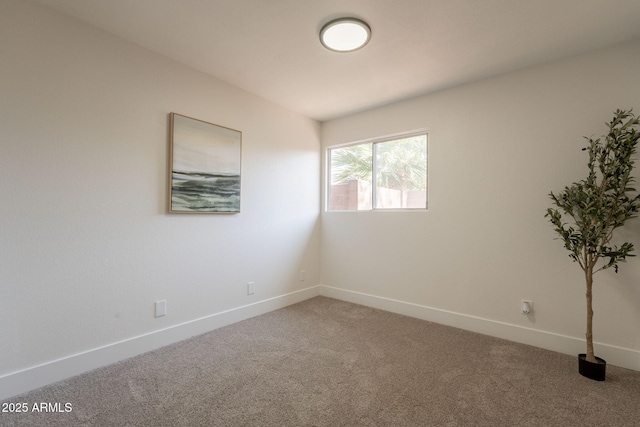 909 S Acapulco Ln Unit A, Tempe, AZ 85281 - carpeted spare room featuring baseboards