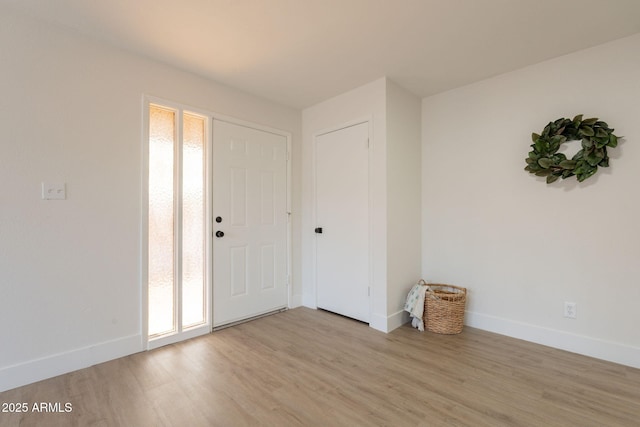 909 S Acapulco Ln Unit A, Tempe, AZ 85281 - foyer with light wood-style floors and baseboards
