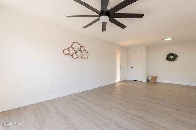 909 S Acapulco Ln Unit A, Tempe, AZ 85281 - empty room with ceiling fan, baseboards, and wood finished floors