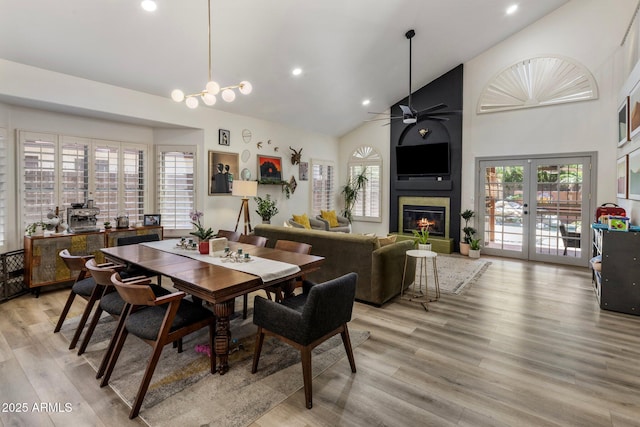 1633 W Acoma Dr, Phoenix, AZ 85023 - dining room with a healthy amount of sunlight, high vaulted ceiling, ceiling fan, and a fireplace