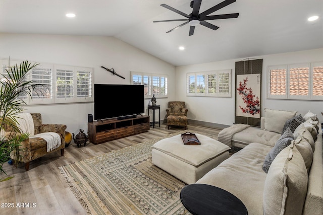 1633 W Acoma Dr, Phoenix, AZ 85023 - living area featuring light wood-type flooring, a ceiling fan, lofted ceiling, and recessed lighting