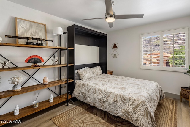 1633 W Acoma Dr, Phoenix, AZ 85023 - bedroom with wood finished floors and baseboards