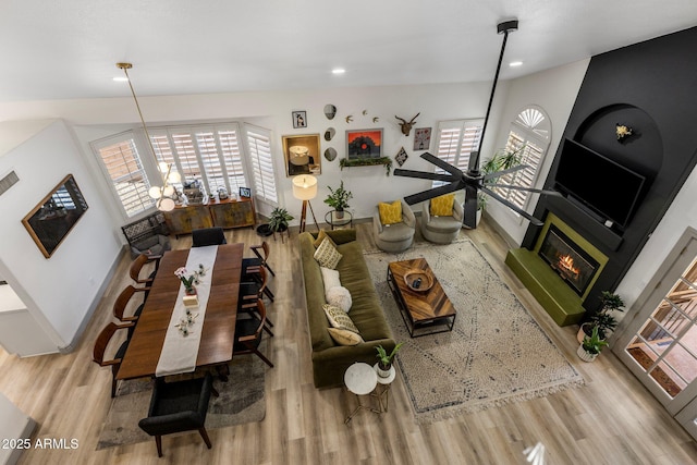 1633 W Acoma Dr, Phoenix, AZ 85023 - living room with a fireplace, wood finished floors, plenty of natural light, and recessed lighting