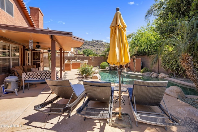 1633 W Acoma Dr, Phoenix, AZ 85023 - view of patio / terrace with an outdoor kitchen, a fenced backyard, and a fenced in pool