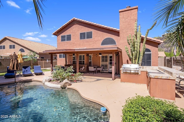 1633 W Acoma Dr, Phoenix, AZ 85023 - exterior space with a fenced backyard, area for grilling, a patio area, and a tile roof