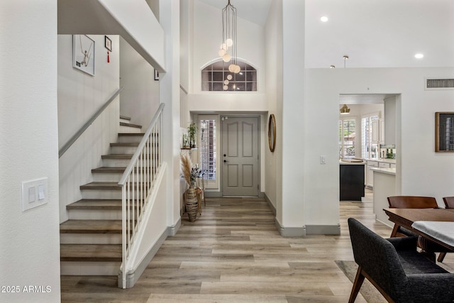 1633 W Acoma Dr, Phoenix, AZ 85023 - entrance foyer with visible vents, baseboards, light wood-type flooring, recessed lighting, and stairs