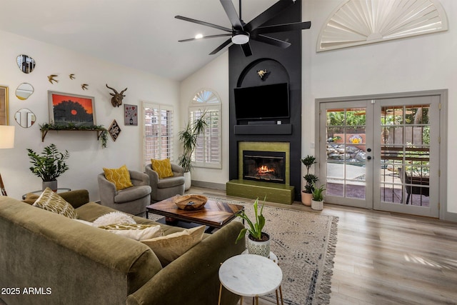 1633 W Acoma Dr, Phoenix, AZ 85023 - living area with a fireplace, a wealth of natural light, ceiling fan, and high vaulted ceiling
