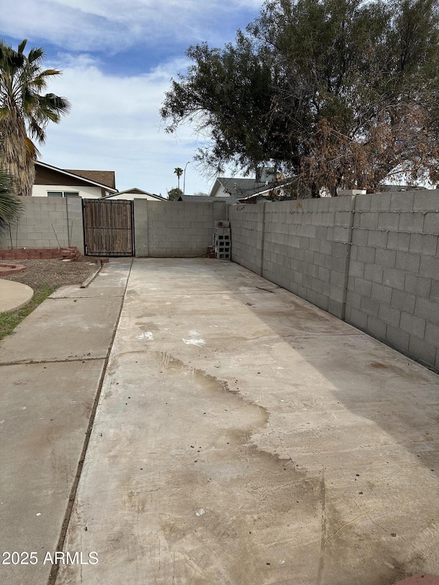 view of yard with a gate and fence