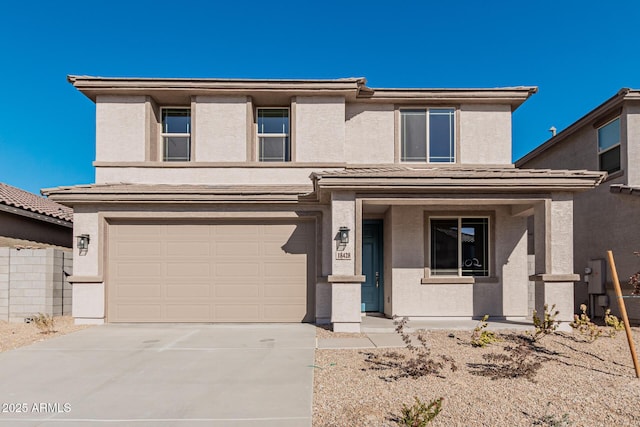 front facade with a garage