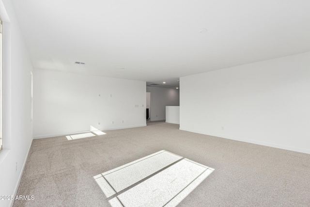 spare room with carpet flooring