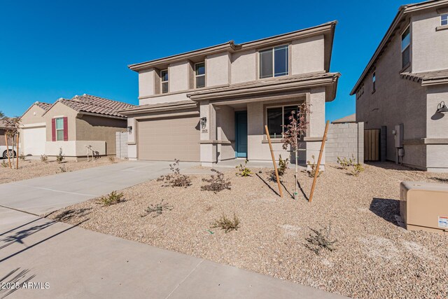 view of front of home with a garage