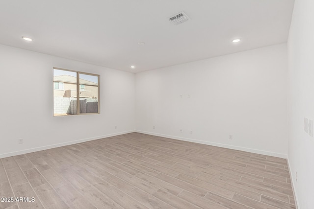 empty room featuring light hardwood / wood-style flooring