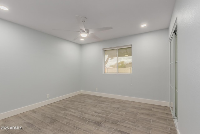 unfurnished bedroom featuring recessed lighting, baseboards, a ceiling fan, and light wood finished floors