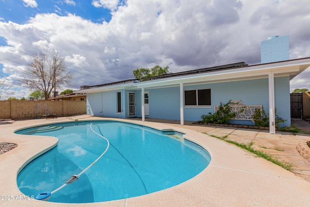 view of pool with a fenced in pool, a patio, and a fenced backyard