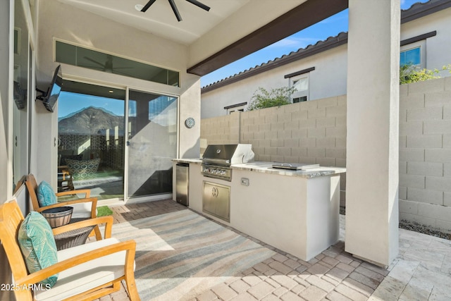 38500 N School House Rd Unit 62, Cave Creek, AZ 85331 - view of patio with area for grilling, a ceiling fan, and fence