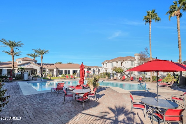 view of pool featuring a patio