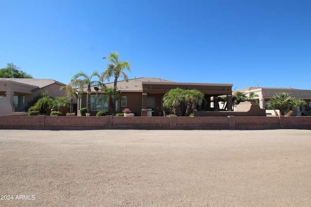 view of front of property with a carport