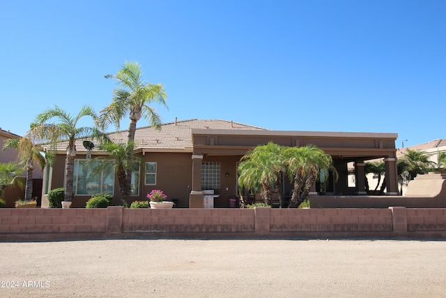 view of front of house featuring a carport