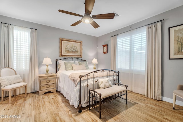 1335 W Via Del Oro, San Tan Valley, AZ 85140 - bedroom with light wood-style flooring, baseboards, and a ceiling fan