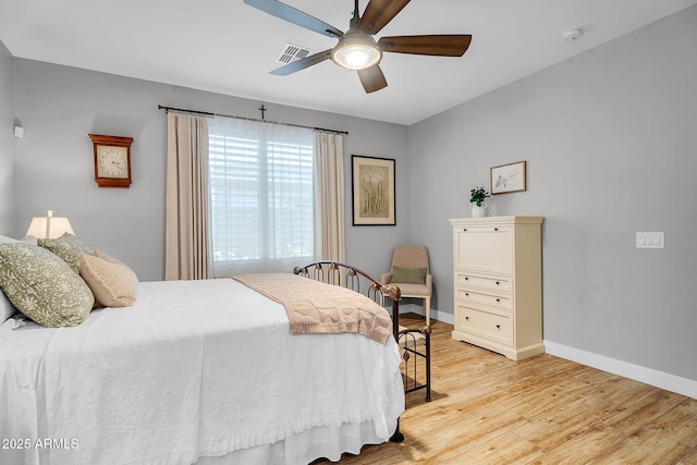 1335 W Via Del Oro, San Tan Valley, AZ 85140 - bedroom with light wood finished floors, baseboards, and a ceiling fan