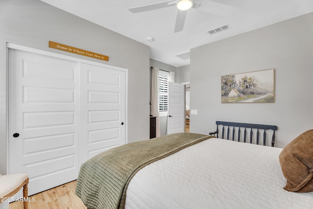 1335 W Via Del Oro, San Tan Valley, AZ 85140 - bedroom featuring wood finished floors, a closet, and a ceiling fan