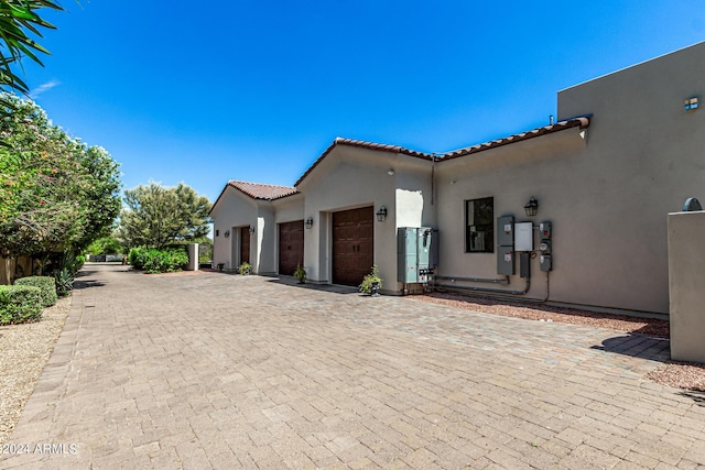 view of home's exterior with a garage