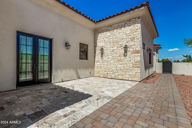 view of patio featuring french doors