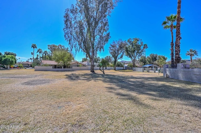 view of yard with fence