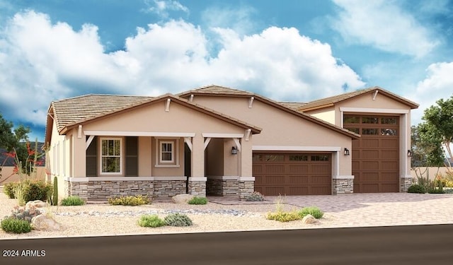 view of front of property with a porch and a garage