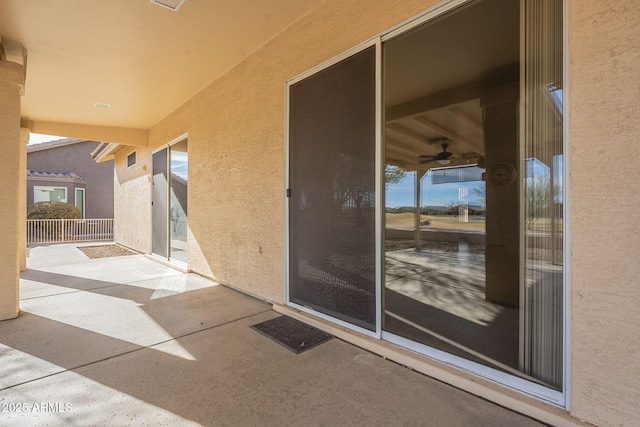 doorway to property featuring a patio area